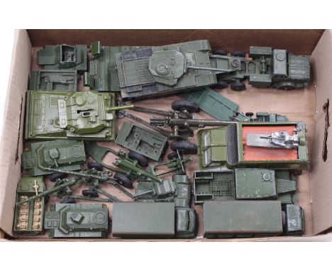 A collection of play-worn Dinky Toys military vehicles, with examples including No. 621 3 Ton Army Wagon, No. 660 Thorneycrof