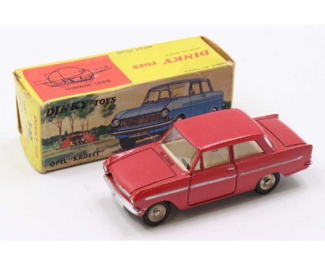 A Dinky Toys No. 540 Opal Kadett comprising red body, cream interior with flat spun hubs in the original card box