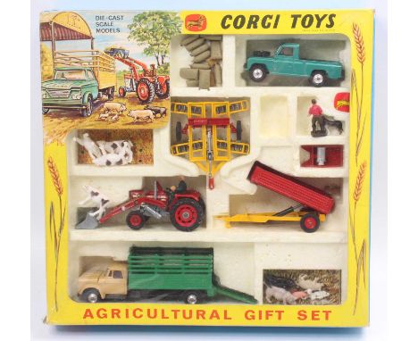 A Corgi Toys gift set No. 5 Agricultural Gift Set, comprising of Massey Ferguson tractor and trailer, Landrover, livestock tr
