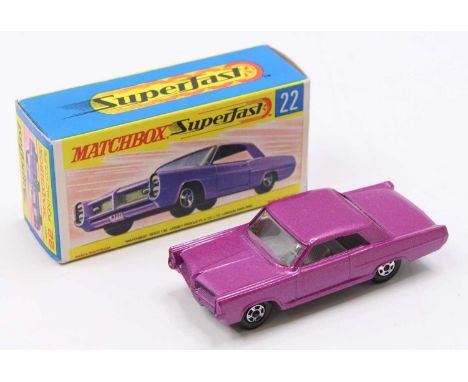 Matchbox Lesney Superfast No. 22 Pontiac GP Sports Coupe, light purple body, with a grey interior, narrow wheels, and a black