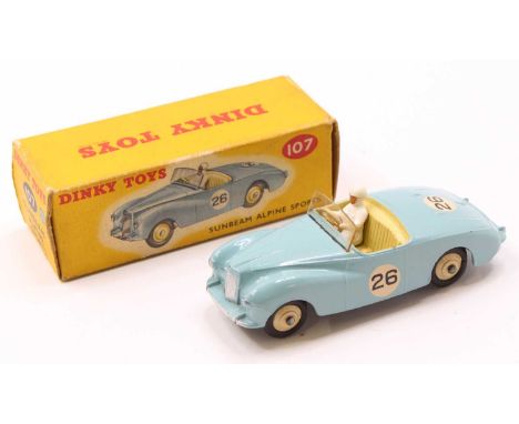 Dinky Toys, 107 Sunbeam Alpine Sports, pale blue body with cream interior and cream rigid hubs, white driver with windscreen,