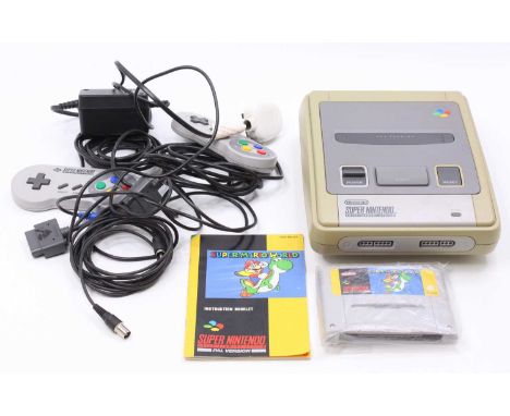 An original Super Nintendo Entertainment System (SNES) PAL version comprising of console, power leads, two hand controllers, 