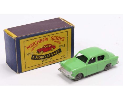 Matchbox Lesney No. 43 Hillman Minx, green body, with silver trim, and metal wheels, the model has some light wear, and the t