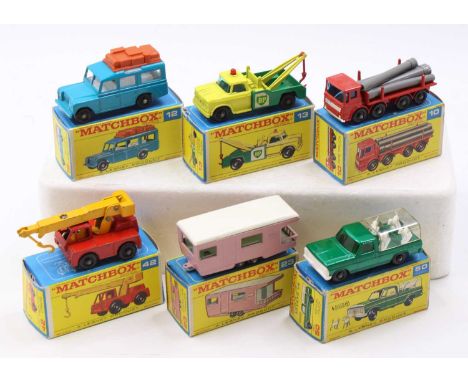 A collection of six various boxed Matchbox E type boxed diecast vehicles to include No. 42 Iron Fairy crane, No. 50 Kennel tr