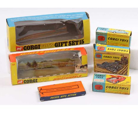 A collection of mixed Corgi Toy empty boxes and box bases to include a No. 218 Aston Martin DB4, the inner box base for the J