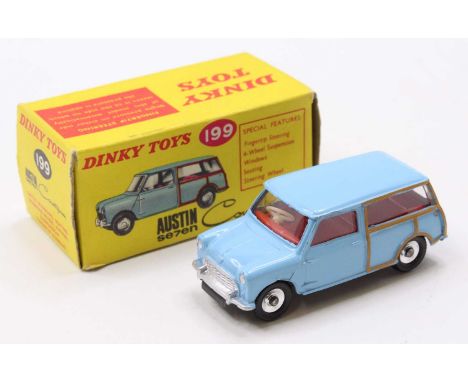 A Dinky Toys No. 199 Austin Seven Countryman comprising light blue body with red interior and spun hubs, housed in the origin