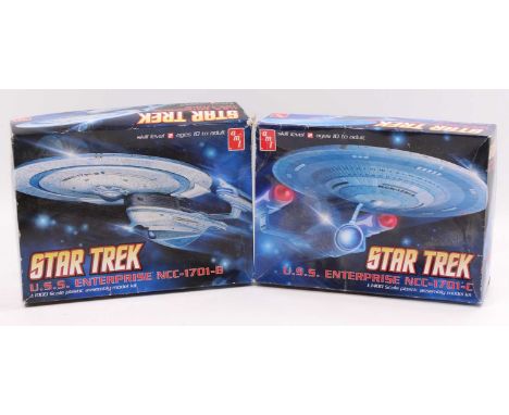 2 AMT Star Trek U.S.S. Enterprise model kits comprising a 1/1400th scale model NCC-1701-C, and a 1/1000th scale NCC-1701-B, b