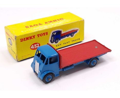 Dinky Toys No. 432 Guy flat truck comprising of rare bright blue cab and chassis with red back and light blue hubs in the ori