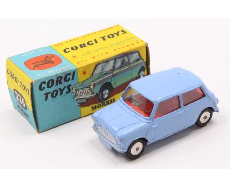 A Corgi Toys No. 226 Morris Mini Minor comprising of light blue body with red interior and spun hubs, housed in the original 