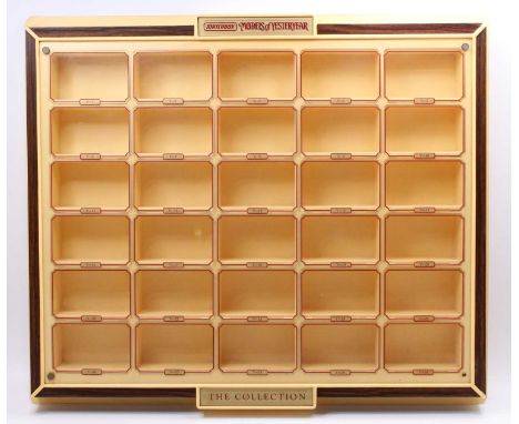 A Matchbox Lesney Models of Yesteryear retailers shop display with 30 compartments, one fixing nut is missing, might benefit 