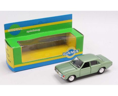 A Gama No. 997 Ford Granada, comprising of light metallic green body with black interior and chromed dished hubs, housed in t