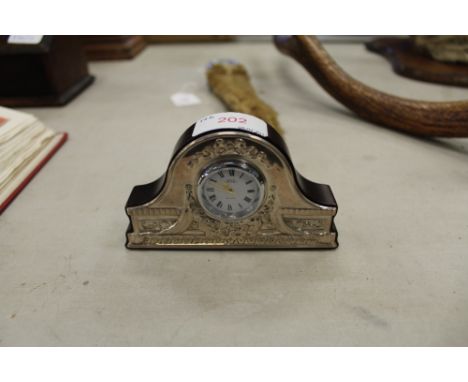 Small silver mounted clock (R Carr)