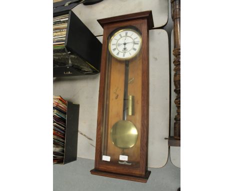 Vienna wall clock, enamelled dial and oak cased