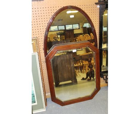 Oval mirror and carved rectangular mirror