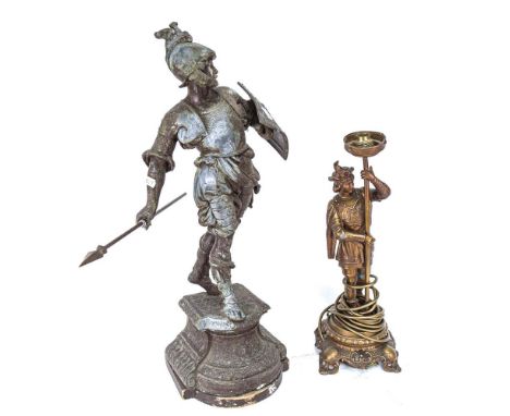 A spelter figure of a warrior with a spear, height 58cm, and a gilt-metal knight figure table lamp 