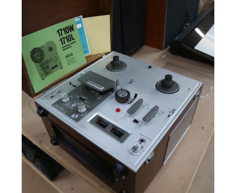 An Akai 4-track stereophonic tape recorder, with operator's manual 
