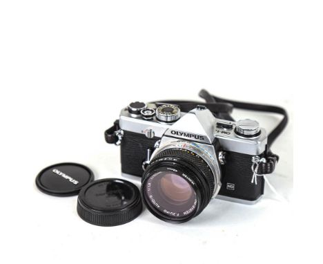 OLYMPUS - a Vintage OM-1n 35mm single lens reflex camera, with Olympus 50mm 1:1.8 lens and Hunter 49mm filter 