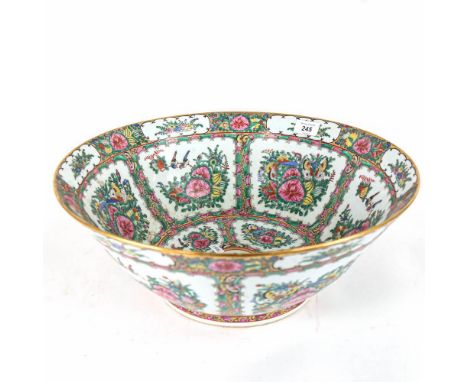 A large Cantonese&nbsp; ceramic bowl, with butterfly and floral decorated panels, finished in gold, signed, 41.5cm diameter