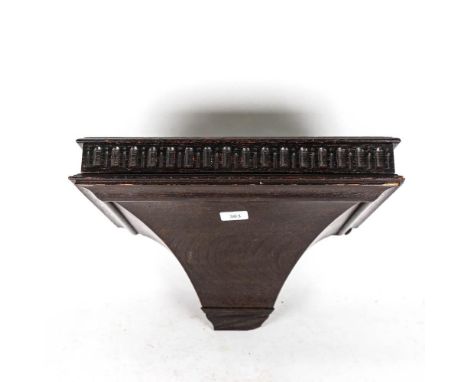 A dark oak wall bracket with frieze drawer, 42cm across 