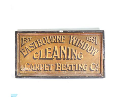 A large Vintage double-sided painted advertising sign in wooden frame, The Eastbourne Window Cleaning and Carpet Beating Comp