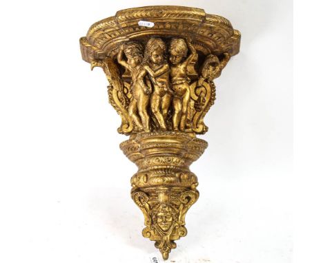 A large gilt composition Classical design wall bracket, height 41cm 