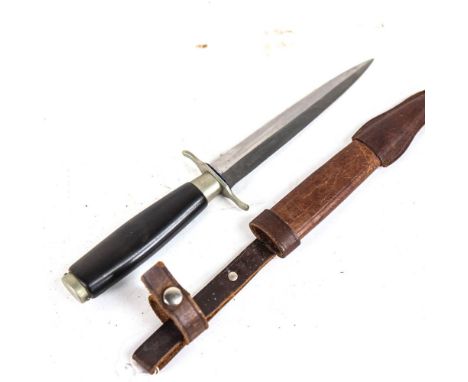 A combat knife by Carl Schlieper of Germany and scabbard, blade length 15.5cm 