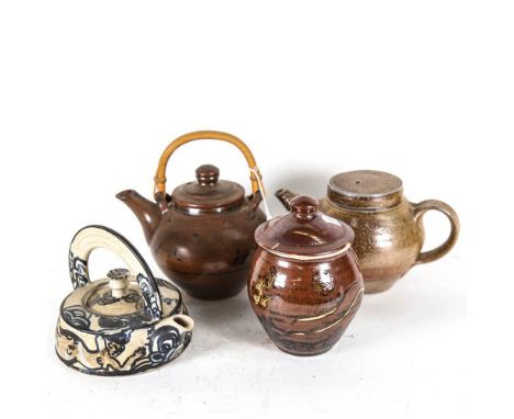 Raku glazed stoneware tea kettle, with bamboo handle, height 19cm overall, a painted pottery tea kettle, a teapot, and a raku