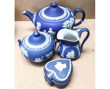 Wedgwood blue Jasperware teapot, height 14cm, matching sugar bowl, a box and a jug (A/F) 