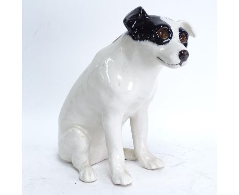 A Winstanley ceramic sculpture of a Jack Russell with glass eyes, signed, 30cm
