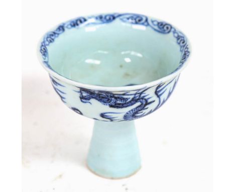 A Chinese blue and white ceramic vessel with dragon decoration, 10cm diameter 