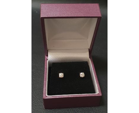 PAIR OF DIAMOND STUD EARRINGSthe round brilliant cut diamond on each approximately 0.25cts (0.5cts in total), in eighteen car