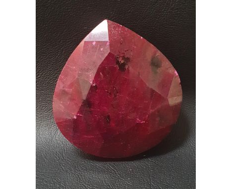 CERTIFIED LOOSE NATURAL RUBYthe pear cut ruby weighing 891.2cts, with GLI Gemmological Report 