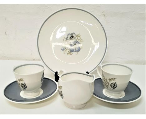 SUSI COOPER TEA SERVICEdecorated in the 'Glen Mist' pattern, comprising tea cups and saucers, side plates, sandwich plates, t