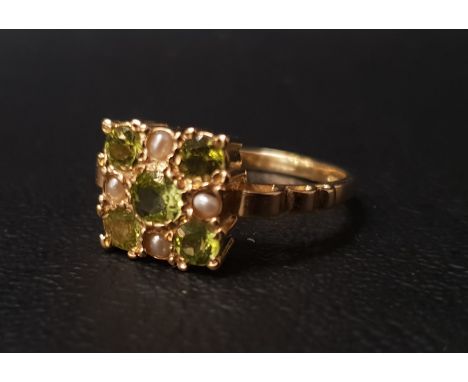 PERIDOT AND SEED PEARL CLUSTER RINGthe five peridots interspersed with seed pearls, on nine carat gold shank, ring size N 