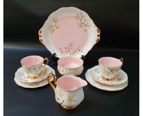 ROYAL ALBERT TEA SETdecorated in the Braemar pattern and comprising five cups, six saucers, six side plates, sandwich plate, 