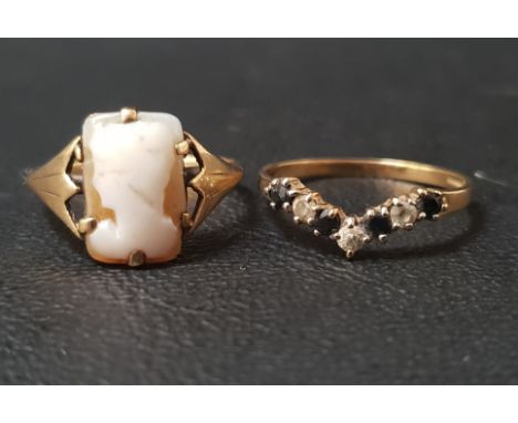 TWO NINE CARAT GOLD RINGSone with a small cameo and the other a wishbone ring set with sapphire and CZ, ring sizes L and N re