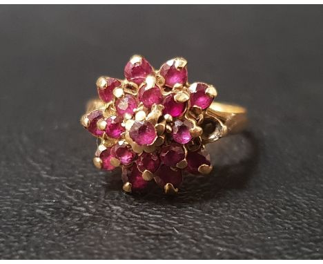 RUBY CLUSTER RINGon unmarked gold shank with stepped setting, ring size L-M 