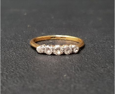 GRADUATED DIAMOND FIVE STONE RINGthe diamonds totalling approximately 0.45cts, on eighteen carat gold shank with platinum sha