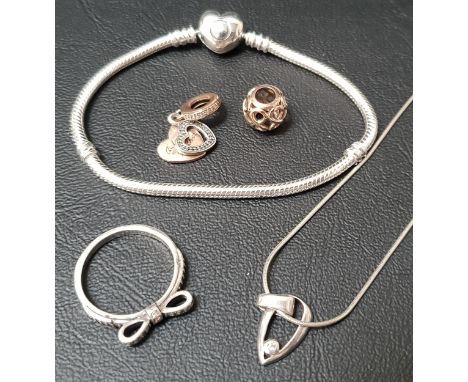 SELECTION OF FASHION JEWELLERYcomprising a Malcolm Gray diamond set silver pendant on silver chain; a Pandora Moments heart c