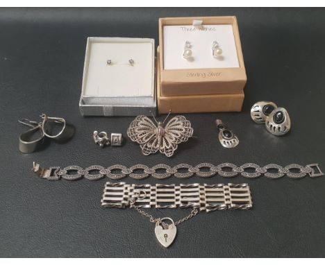 GOOD SELECTION OF SILVER JEWELLERYcomprising a pair of onyx set Native American Bear claw design earrings with matching penda