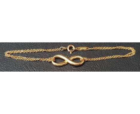 TIFFANY & CO. EIGHTEEN CARAT GOLD INFINITY BRACELETthe double chain bracelet with central infinity symbol, 17.3cm long 