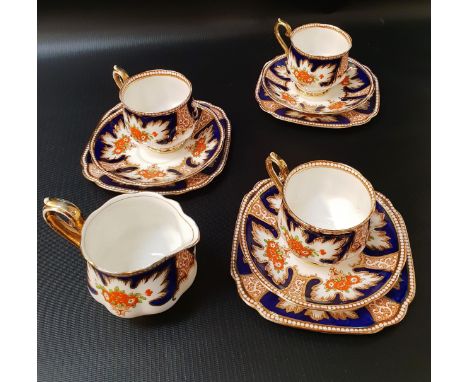 ROYAL ALBERT TEA SETdecorated in the Royalty pattern and comprising ten cups and saucers, ten side plates and a milk jug (31)