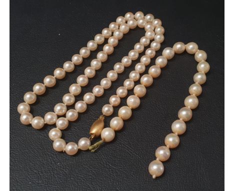 PEARL NECKLACEwith nine carat gold clasp, 47cm long, together with a section of the pearl necklace which has been removed at 