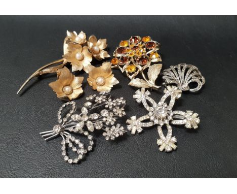 VINTAGE BOUCHER SIMULATED PEARL SET FLOWER BROOCH AND MATCHING EARRINGSin gilt metal; together with four vintage paste set br