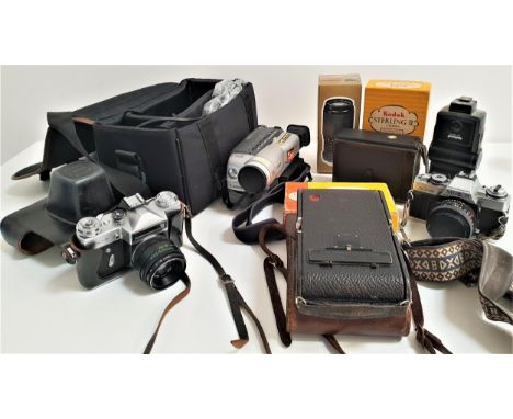 SELECTION OF CAMERAS AND CAMERA EQUIPMENTincluding a Cannon 8mm camcorder and case, Zenit E 35mm camera, Minolta 35mm camera,