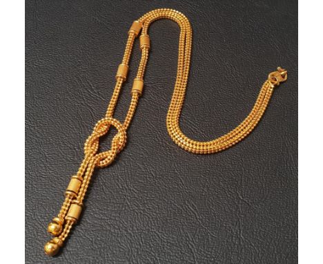 TWENTY-TWO CARAT GOLD NECKLACEthe chain link with knot detail, approximately 22.4 grams 