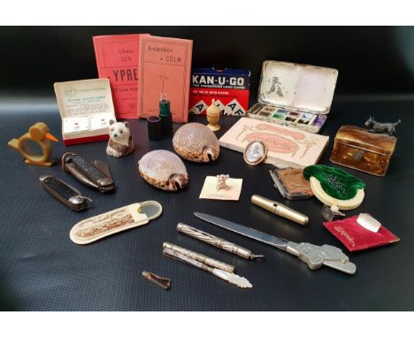 MIXED LOT OF COLLECTABLEScontained in a small case including a decorative measuring tape, watercolour paint box, 1889 diary, 