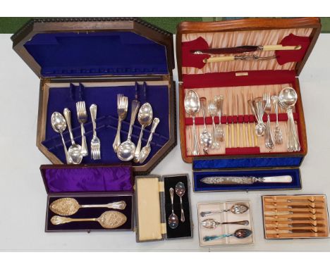 SELECTION OF CASED FLATWAREincluding an oak part canteen of assorted cutlery, oak canteen of assorted cutlery, cased cake kni