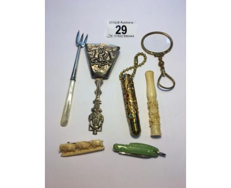 A mixed lot including Dutch caddy spoon, cheroot holder, silver fork, etc