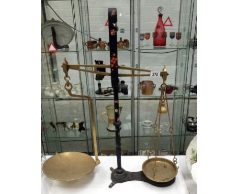 A set of brass and iron balance scales